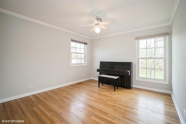 3935 Russett Ln, Northbrook, IL 60062 - sitting room with a ceiling fan, visible vents, light wood-type flooring, baseboards, and ornamental molding