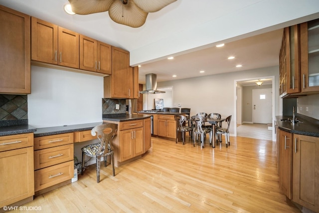 3935 Russett Ln, Northbrook, IL 60062 - kitchen with light wood-style floors, decorative backsplash, ceiling fan, and range hood