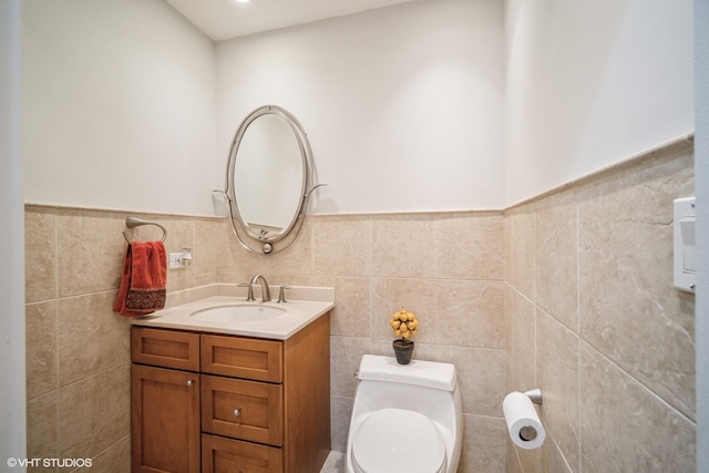 3935 Russett Ln, Northbrook, IL 60062 - bathroom with vanity, tile walls, wainscoting, and toilet