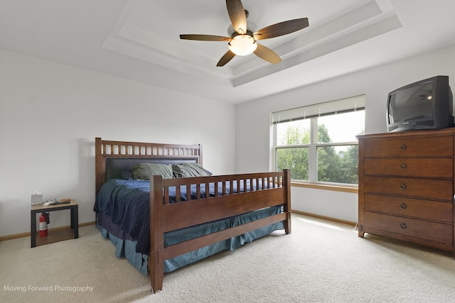 3149 Primrose St, Elgin, IL 60124 - carpeted bedroom featuring a tray ceiling and a ceiling fan