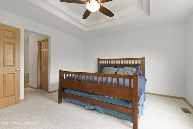 3149 Primrose St, Elgin, IL 60124 - bedroom featuring carpet floors, a raised ceiling, and ceiling fan