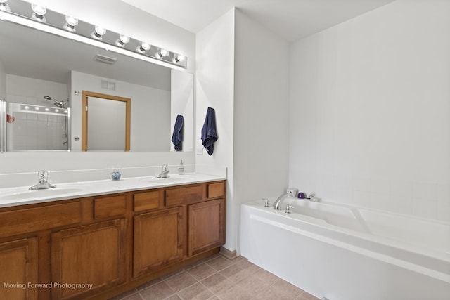 3149 Primrose St, Elgin, IL 60124 - bathroom featuring double vanity, a bath, tiled shower, and tile patterned floors