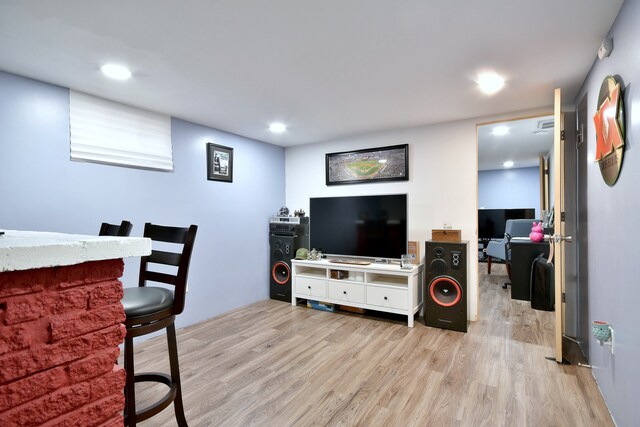 living area featuring recessed lighting and wood finished floors