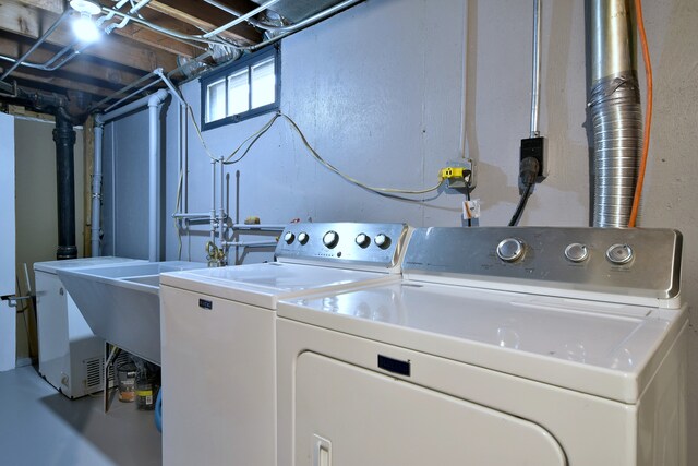 laundry area with laundry area and washing machine and dryer