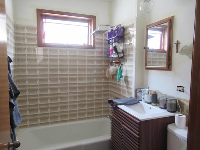 2952 S Bonfield St, Chicago, IL 60608 - full bathroom featuring shower / bathtub combination, toilet, plenty of natural light, and vanity