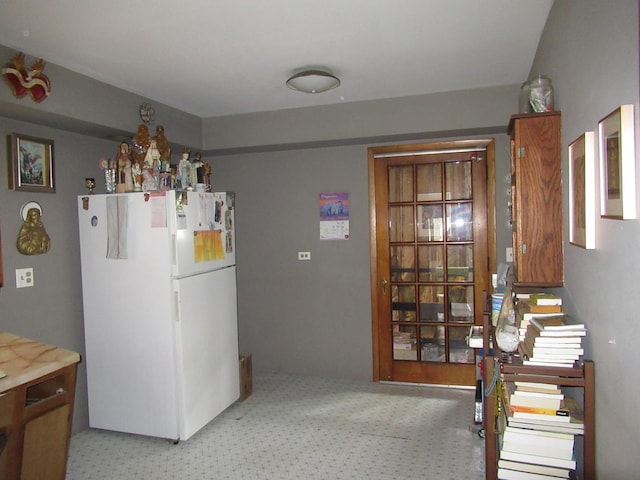 2952 S Bonfield St, Chicago, IL 60608 - kitchen featuring freestanding refrigerator and light carpet