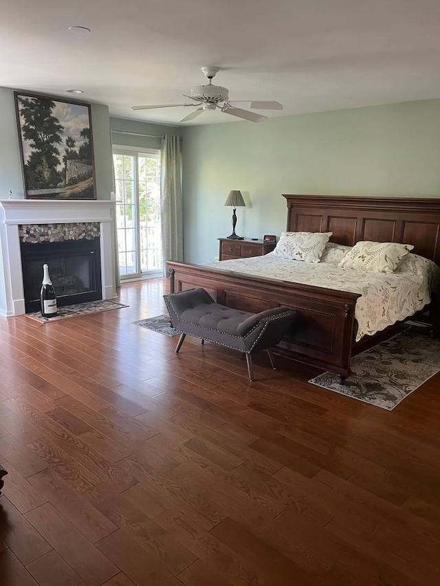 24270 N Forest Dr, Lake Zurich, IL 60047 - bedroom with wood finished floors, a high end fireplace, and a ceiling fan