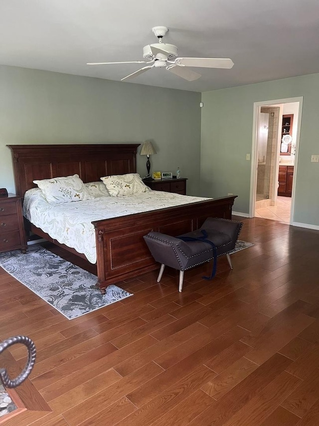 24270 N Forest Dr, Lake Zurich, IL 60047 - bedroom with wood finished floors, ceiling fan, ensuite bathroom, and baseboards