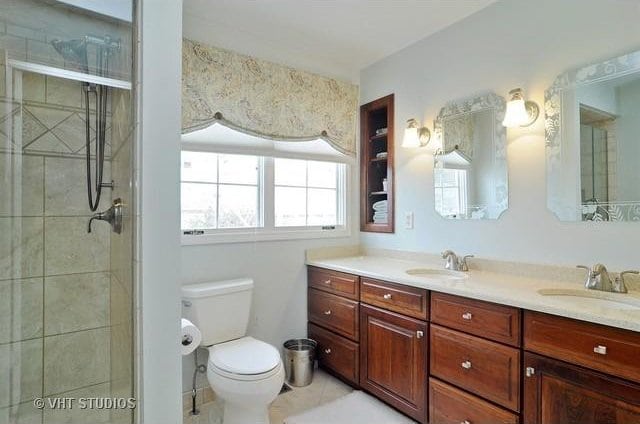 24270 N Forest Dr, Lake Zurich, IL 60047 - full bath with toilet, double vanity, tiled shower, and tile patterned flooring