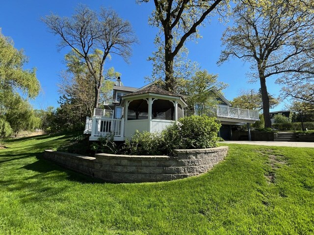 24270 N Forest Dr, Lake Zurich, IL 60047 - view of front of house with a front lawn and a wooden deck
