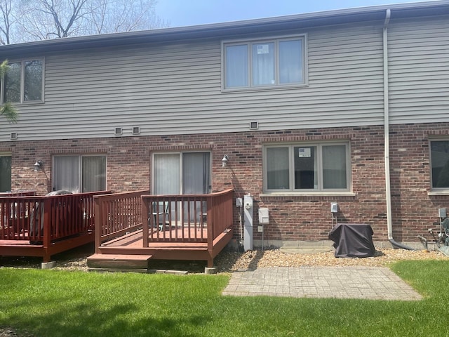 4305 W Termunde Dr, Alsip, IL 60803 - rear view of house with brick siding and a wooden deck
