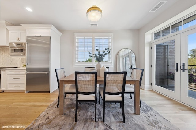 514 Hillgrove Ave Unit 303, Western Springs, IL 60558 - dining room with french doors and light wood-type flooring