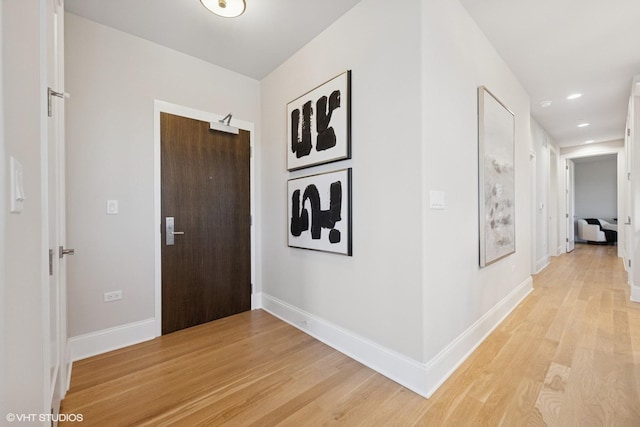 514 Hillgrove Ave Unit 303, Western Springs, IL 60558 - hall featuring light wood finished floors, baseboards, and recessed lighting