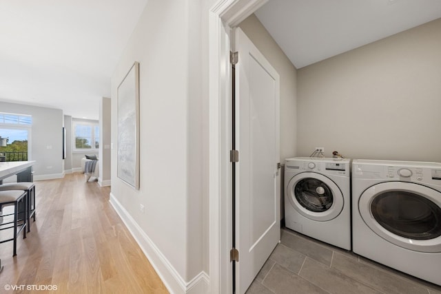 514 Hillgrove Ave Unit 303, Western Springs, IL 60558 - clothes washing area with washer and dryer, light wood-type flooring, and baseboards