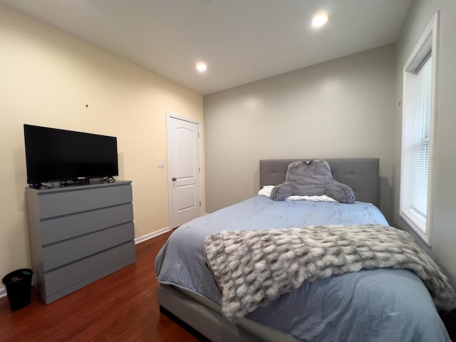 bedroom featuring recessed lighting, baseboards, and wood finished floors