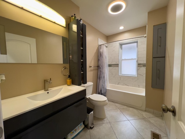 bathroom with shower / tub combo with curtain, vanity, toilet, tile patterned floors, and visible vents