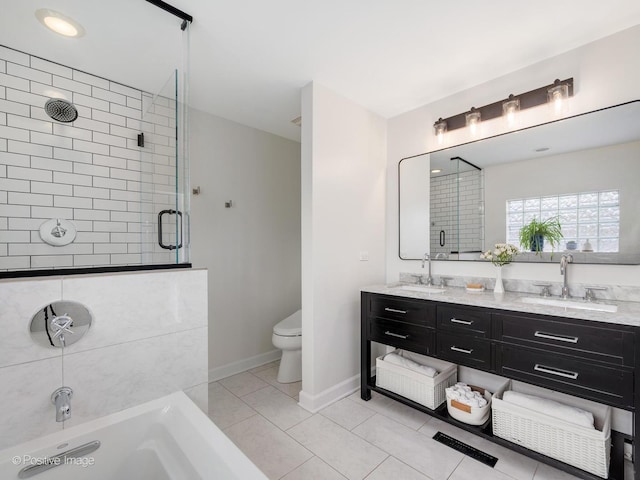 2119 W Evergreen Ave Unit 3W, Chicago, IL 60622 - bathroom with a shower stall, double vanity, baseboards, tile patterned floors, and toilet