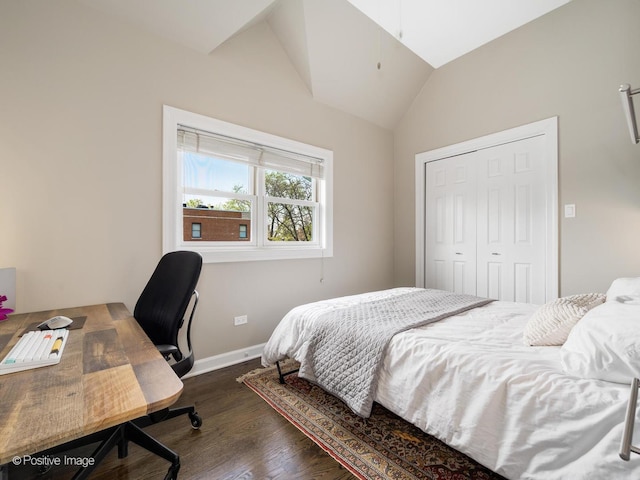 2119 W Evergreen Ave Unit 3W, Chicago, IL 60622 - bedroom featuring wood finished floors, baseboards, lofted ceiling, a desk, and a closet