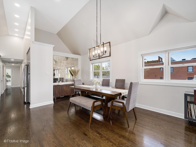 2119 W Evergreen Ave Unit 3W, Chicago, IL 60622 - dining area featuring dark wood finished floors, a chandelier, high vaulted ceiling, baseboards, and recessed lighting