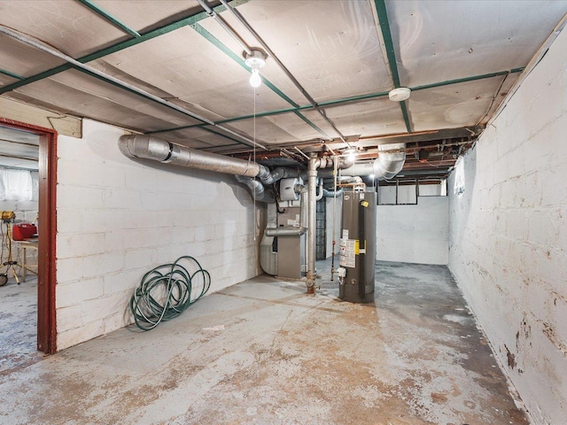 unfinished basement with water heater