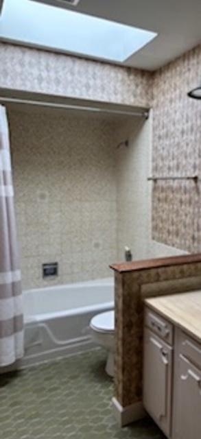 2700 Chariot Ln, Olympia Fields, IL 60461 - full bath featuring toilet, shower / tub combo with curtain, vanity, a skylight, and tile patterned floors