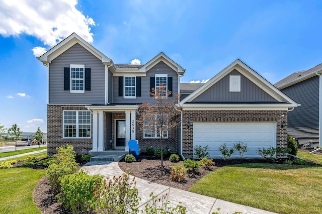 traditional home with brick siding, an attached garage, and a front yard
