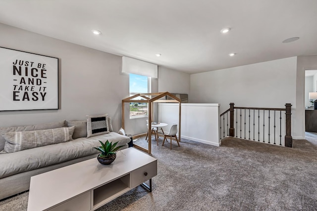 living room featuring carpet flooring, recessed lighting, and baseboards
