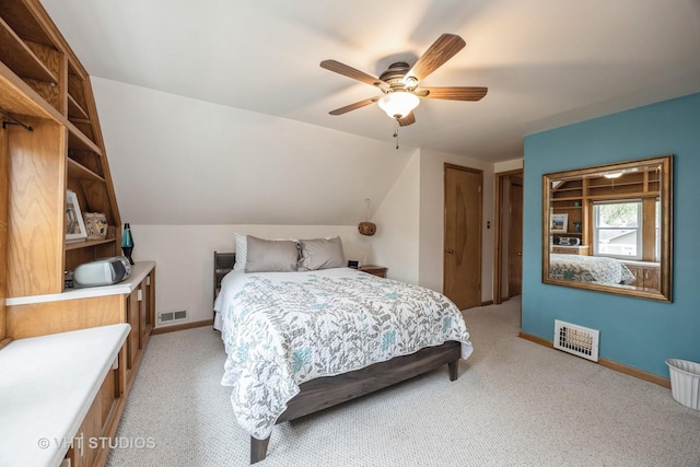 bedroom featuring ceiling fan, light colored carpet, and visible vents