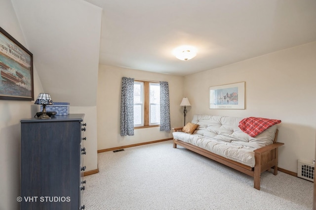 sitting room with baseboards, carpet floors, and visible vents