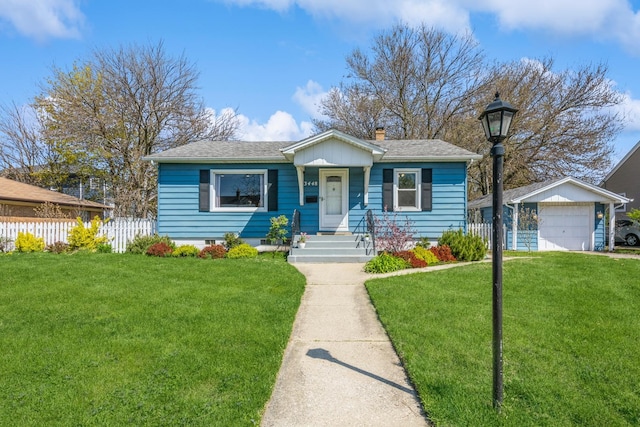 3448 Ann St, Lansing, IL 60438 - view of front of home with a garage, a front lawn, fence, roof with shingles, and a chimney