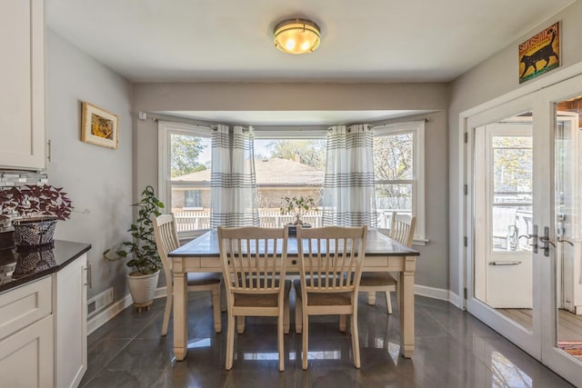 3448 Ann St, Lansing, IL 60438 - dining space with visible vents, baseboards, and a healthy amount of sunlight