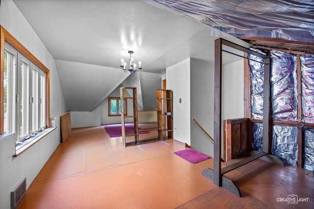 33 Chestnut Ave, Clarendon Hills, IL 60514 - additional living space with a chandelier and lofted ceiling
