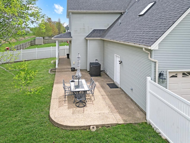 1309 Broad Creek Rd, Bloomington, IL 61704 - view of patio / terrace featuring a fenced backyard and central AC unit