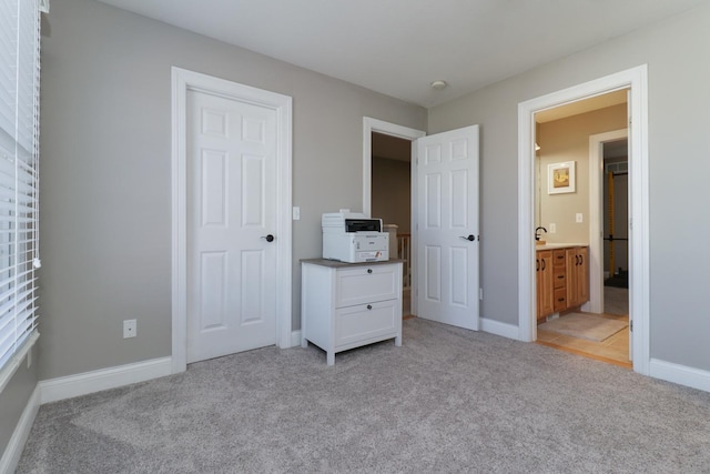 1309 Broad Creek Rd, Bloomington, IL 61704 - unfurnished bedroom with light colored carpet, baseboards, and ensuite bath