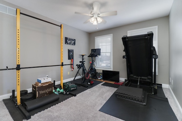 1309 Broad Creek Rd, Bloomington, IL 61704 - exercise room featuring baseboards, a ceiling fan, and carpet floors
