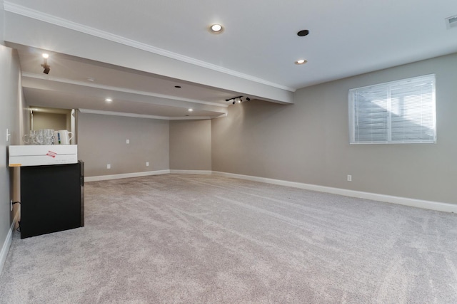 1309 Broad Creek Rd, Bloomington, IL 61704 - below grade area with baseboards, ornamental molding, carpet, and visible vents