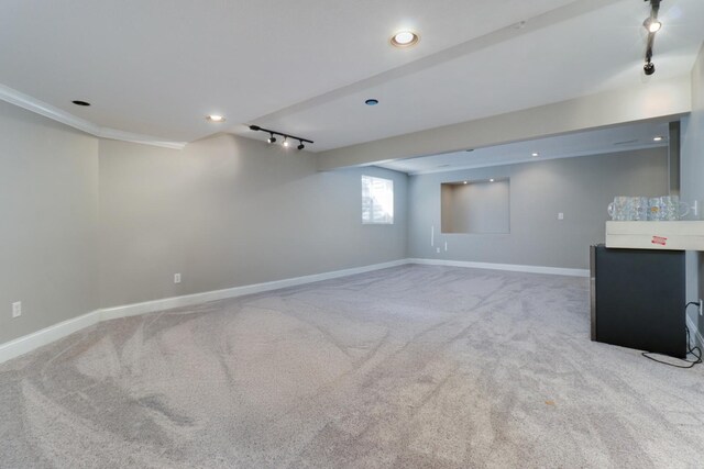 1309 Broad Creek Rd, Bloomington, IL 61704 - basement with baseboards, rail lighting, carpet flooring, and recessed lighting