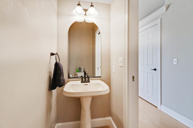 1309 Broad Creek Rd, Bloomington, IL 61704 - bathroom featuring baseboards and wood finished floors