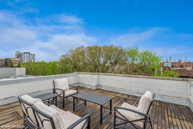 deck featuring outdoor lounge area