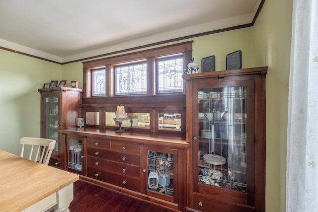 130 N Elm St, Leland, IL 60531 - dining area featuring dark wood finished floors and ornamental molding