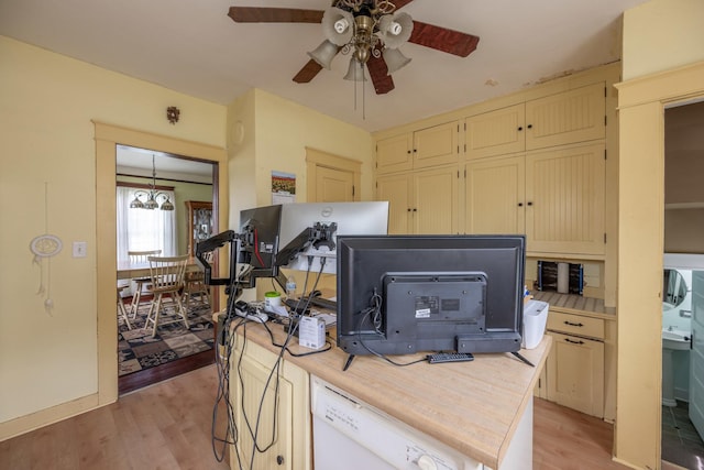 130 N Elm St, Leland, IL 60531 - interior space featuring light wood finished floors, dishwasher, light countertops, ceiling fan with notable chandelier, and cream cabinetry