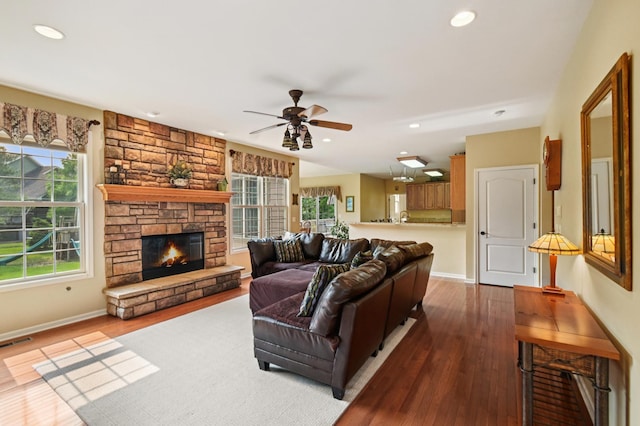 7770 Farrell Dr, Lakewood, IL 60014 - living area with a ceiling fan, dark wood-style floors, a fireplace, and recessed lighting