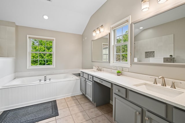 7770 Farrell Dr, Lakewood, IL 60014 - bathroom with double vanity, healthy amount of natural light, a garden tub, lofted ceiling, and tile patterned floors
