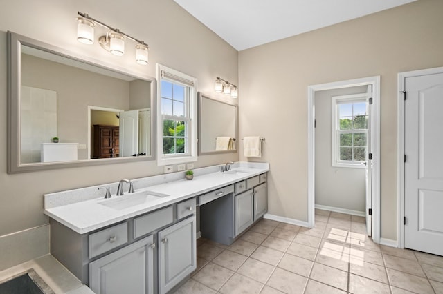 7770 Farrell Dr, Lakewood, IL 60014 - full bath with double vanity, healthy amount of natural light, and tile patterned floors