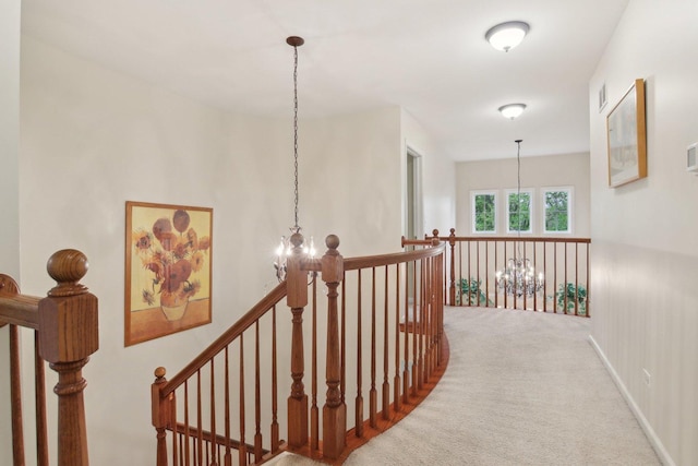 7770 Farrell Dr, Lakewood, IL 60014 - hall featuring an upstairs landing, a chandelier, and carpet flooring