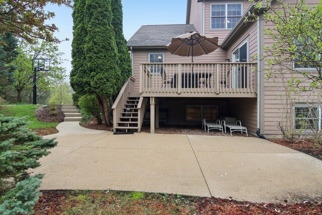 7770 Farrell Dr, Lakewood, IL 60014 - rear view of house featuring stairs, a wooden deck, and a patio area