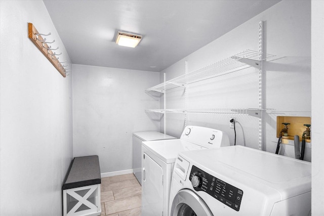 968 N Lancaster Cir S, Elgin, IL 60177 - washroom featuring separate washer and dryer, laundry area, and baseboards