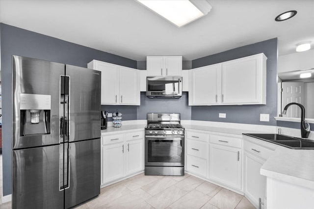 968 N Lancaster Cir S, Elgin, IL 60177 - kitchen featuring a sink, white cabinetry, appliances with stainless steel finishes, and light countertops