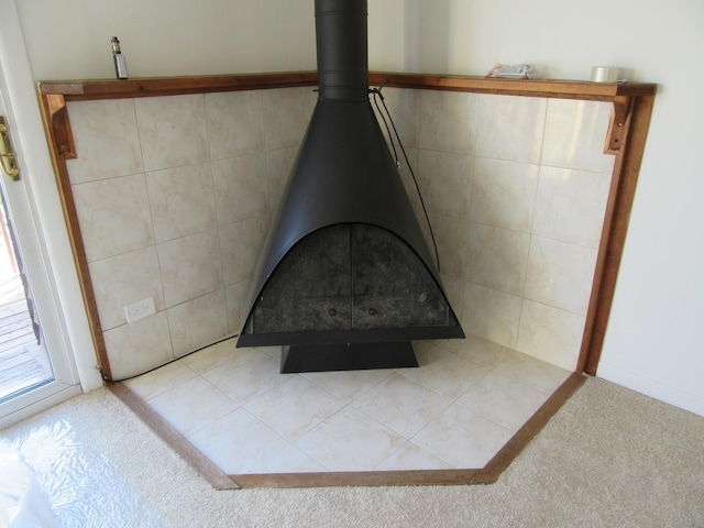 733 Limerick Ln Unit 3D, Schaumburg, IL 60193 - detailed view of a wood stove and carpet