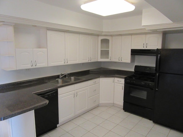 733 Limerick Ln Unit 3D, Schaumburg, IL 60193 - kitchen with black appliances, a sink, under cabinet range hood, dark countertops, and light tile patterned floors